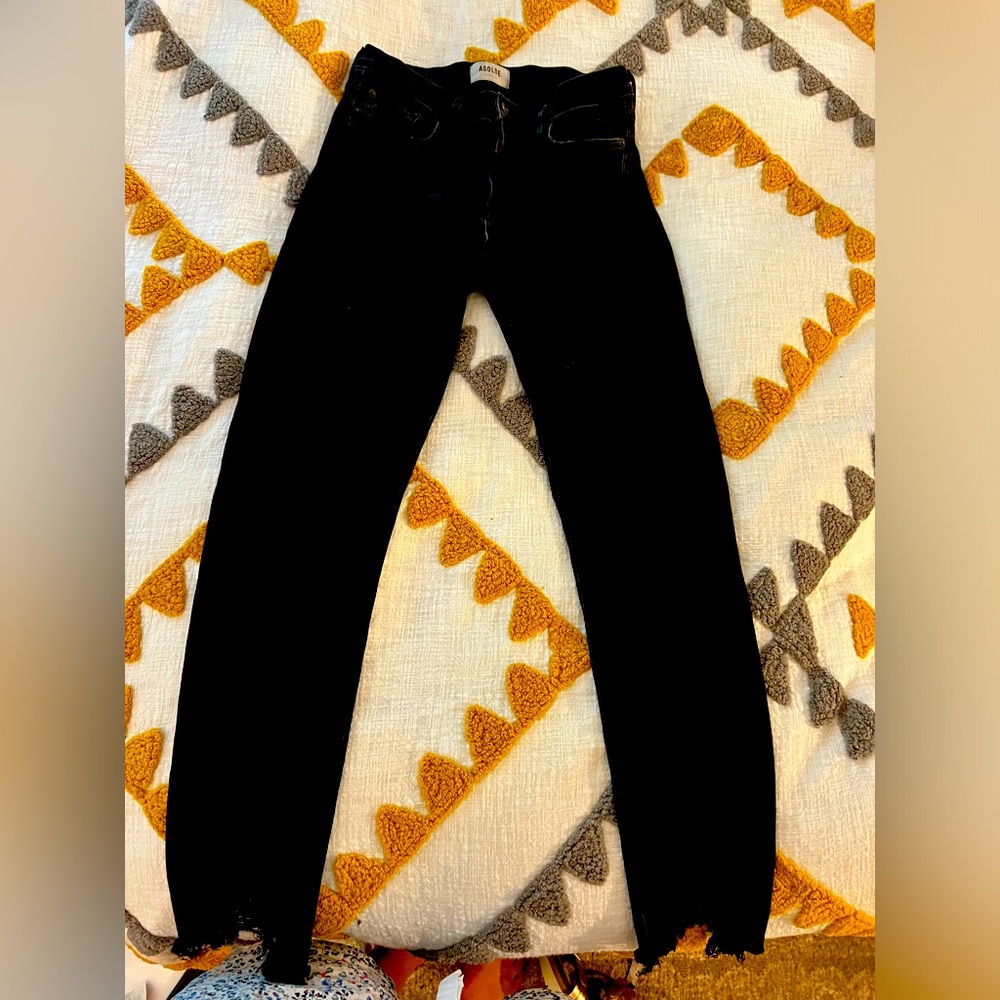 Ahold black skinny jeans with frayed hem.